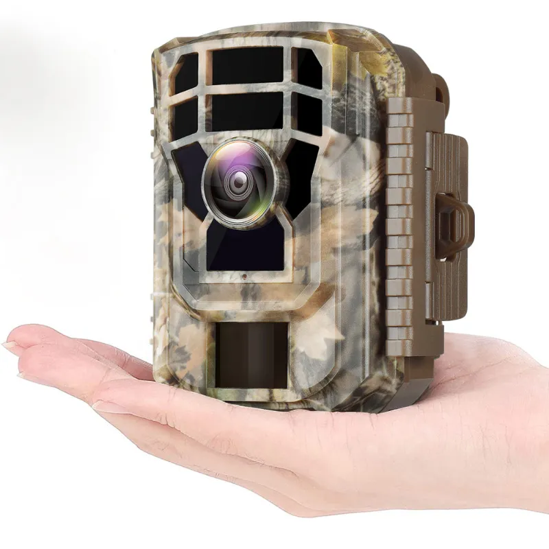 Voopeak T20 mini trail camera mounted on a tree trunk