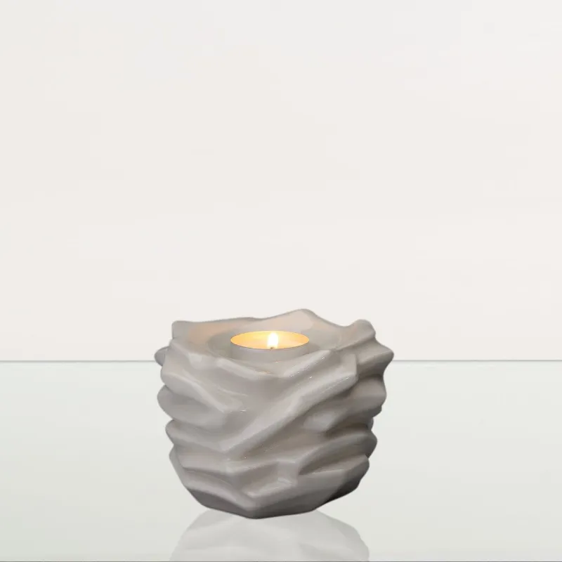 Pulvis Art Urns Candleholder Keepsake Urn For Ashes in off-white ceramic with petal design
