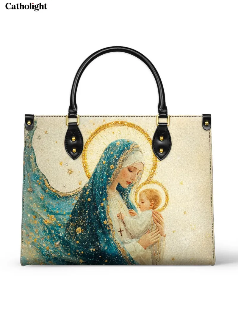Catholight Divine Mother's Embrace Leather Bag with Virgin Mary artwork in gold and blue