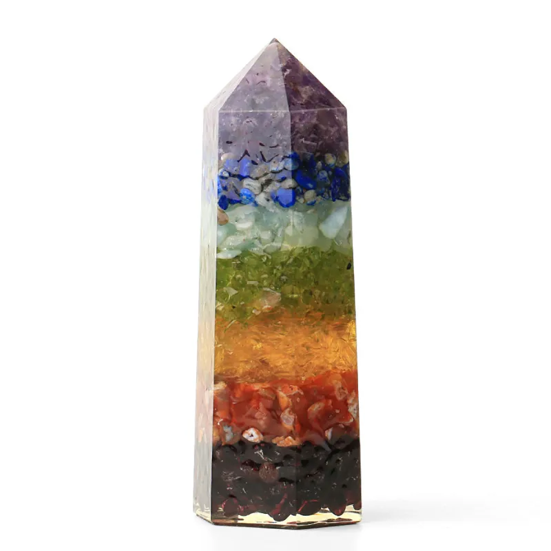 Turix 7 Chakras Crystal Orgonite Point showing a tall resin pyramid with colorful crystal layers