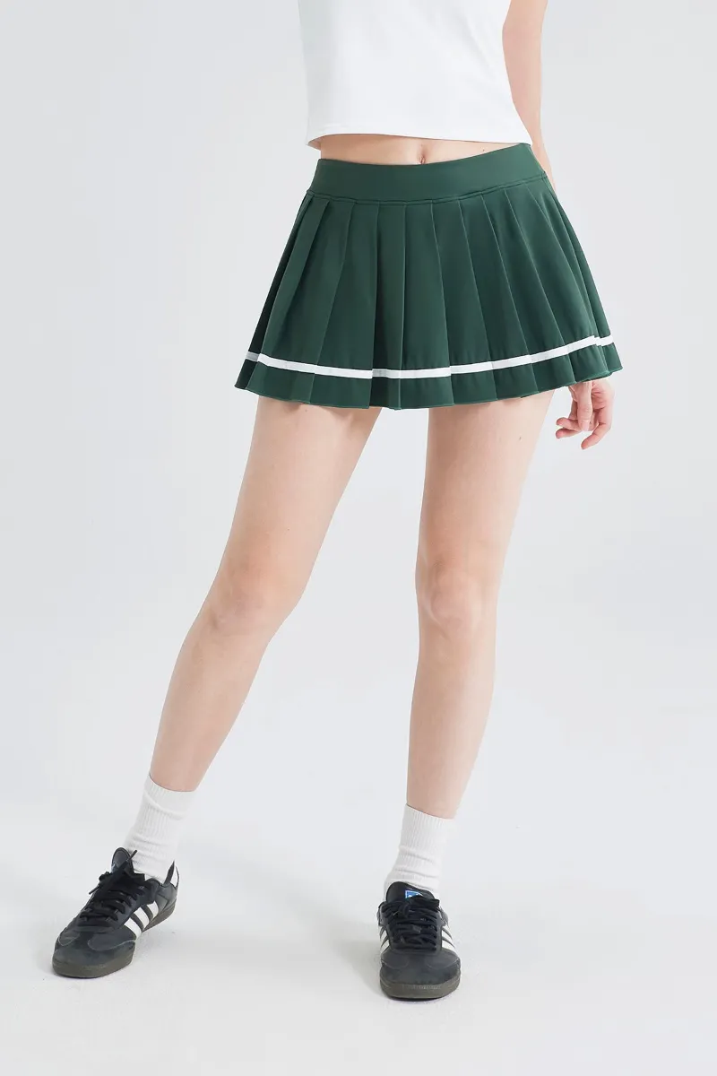 SALTUM Athletic Contrast Stripe Pleated Skirt, sporty mini skirt with color-block detail and built-in shorts