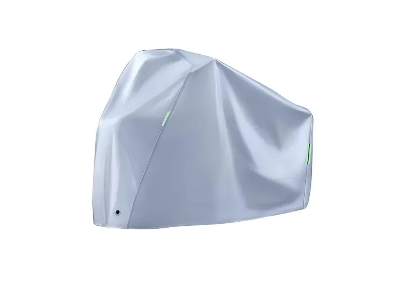 Qiolor Ebike Cover shown protecting an electric bicycle from outdoor elements