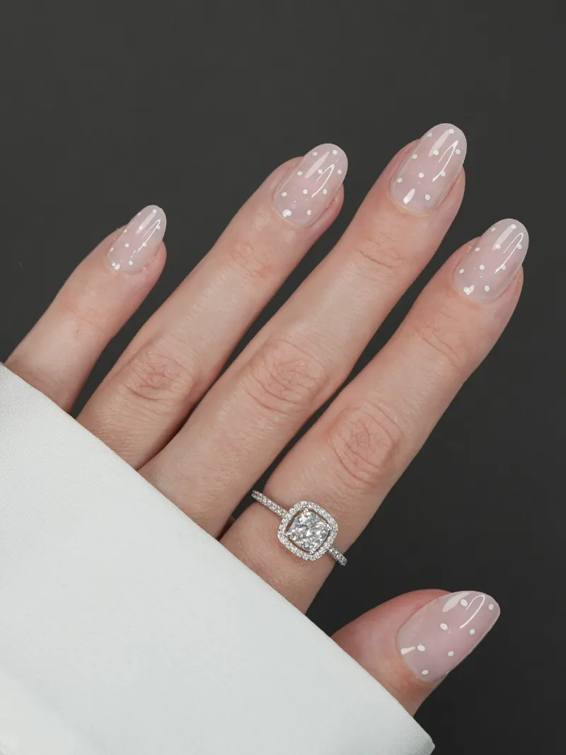 Roxy Nails Paris Polka dots press-on nails with white polka dots on nude translucent base