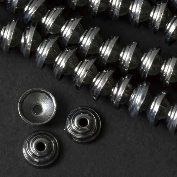 Cherry Tree Beads Gun Metal 4x11mm Spiral Bead Cap strand shown close up