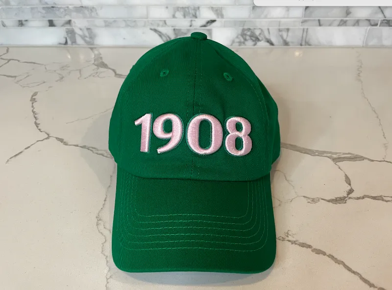 Embellished 1908 Cap in green cotton with pink and green embroidered detail and curved brim
