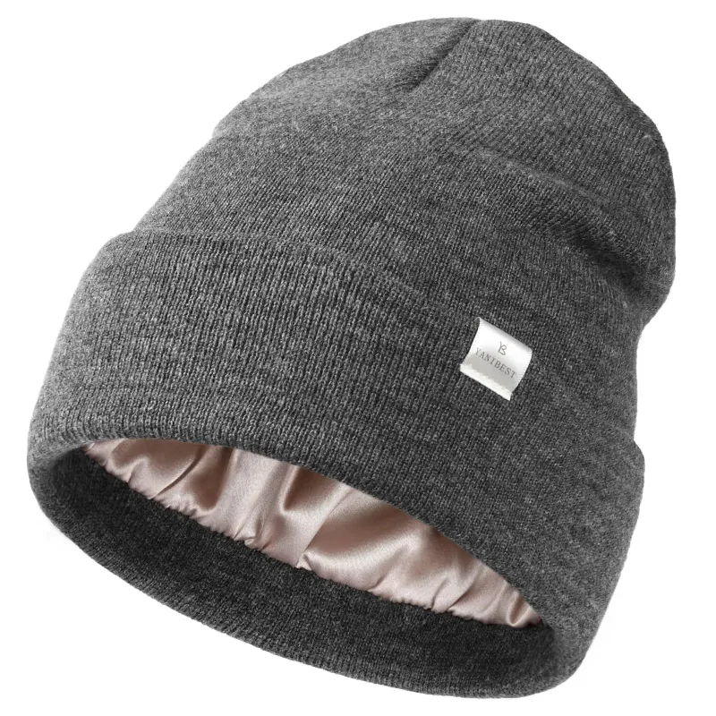 Yanibest Butter Satin Lined Knit Skull Beanie in dark grey on a plain background