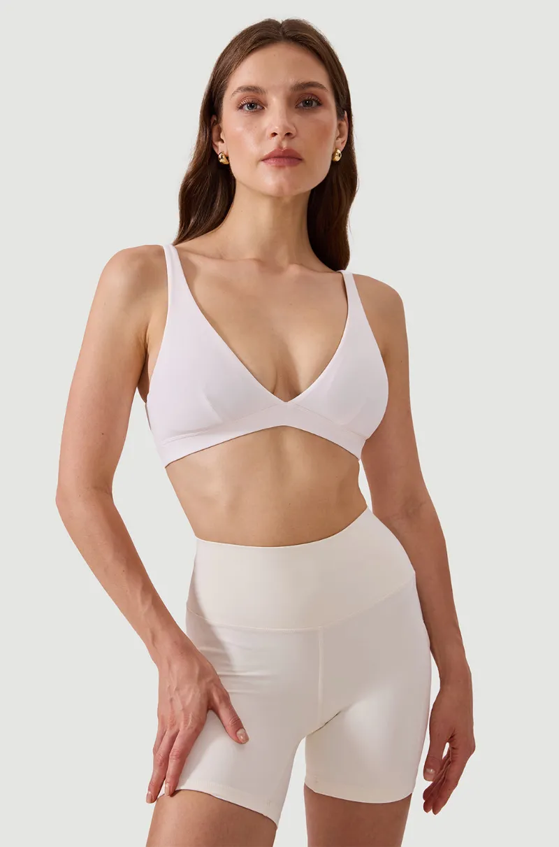 Essenther Global Deep V Neck Sport Bra with plunge neckline and U-back
