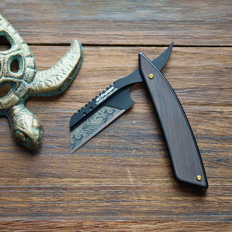 The Stinger Tools Stinger Vintage Straight Razor Style Utility Blade with handle closed