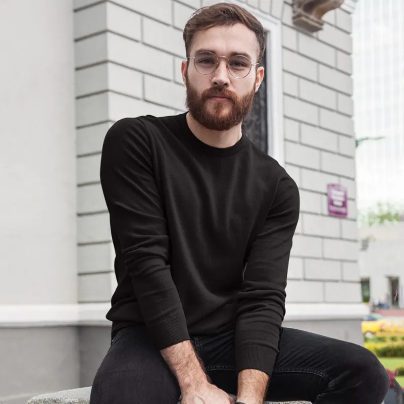 The Banyan Tee US Black Sweatshirt, front view on model