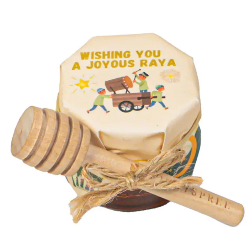 HoneySpree Joyous Raya Mini Honey Jar With Dipper, honey jar with wooden dipper on white background
