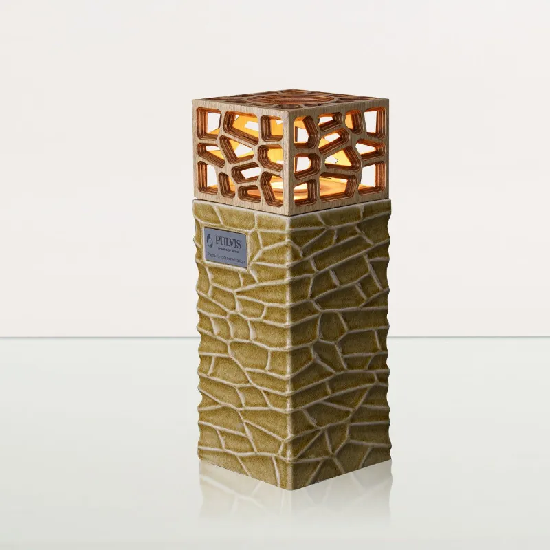 Pulvis Art Urns Everlasting Flame Cremation Urn in dark sand ceramic with integrated candle holder