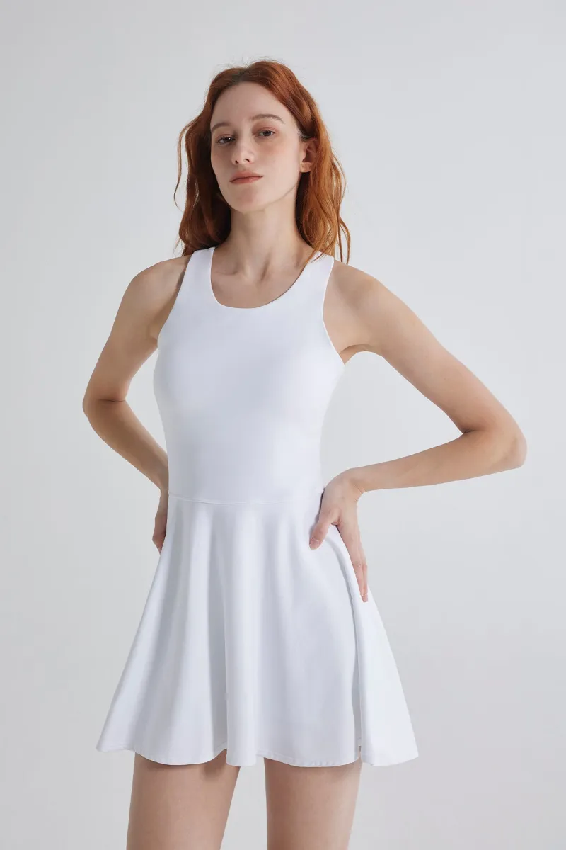 SALTUM Ballet Tie-Back Dress in elegant activewear style with tie-back detail