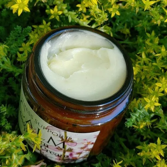 Spirit Nest Calm Magnesium Body Cream jar with botanical wellness formula