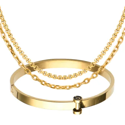 Sleek Fit Jewelry Essential Set Gold, gold chain necklaces and a bangle bracelet arranged together