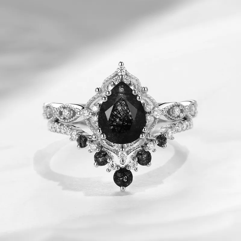Starlandus Elara antique pear cut black rutilated quartz engagement ring set with openwork frame