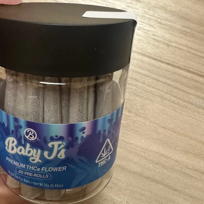 Baked Bags Half Ounce Baby J's 28 x .5g Pre-Rolls in Jar Gelonade strain in glass container