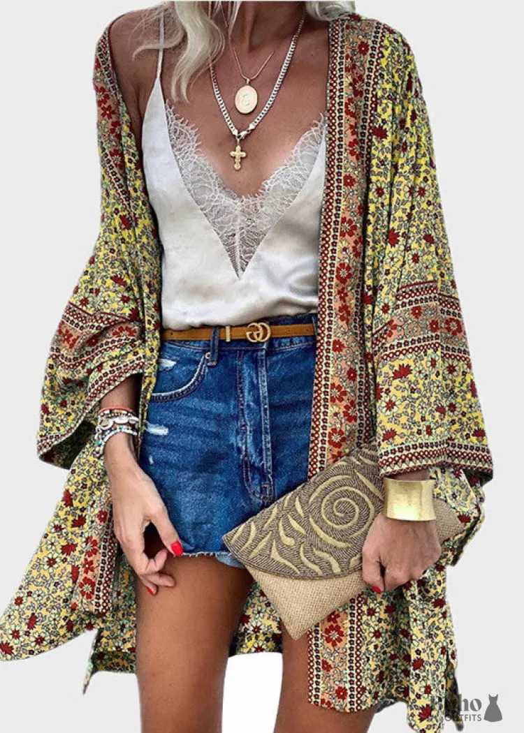 Boho Dress 2024 Style Hollow Out Crochet Knit with Tassels Yellow Boho Cardigan showing the loose fit