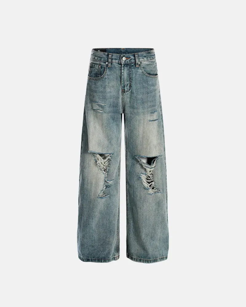 INFLATION Bamboo Weave Distressed Baggy Jeans in blue with heavy distressed knees and wide-leg fit