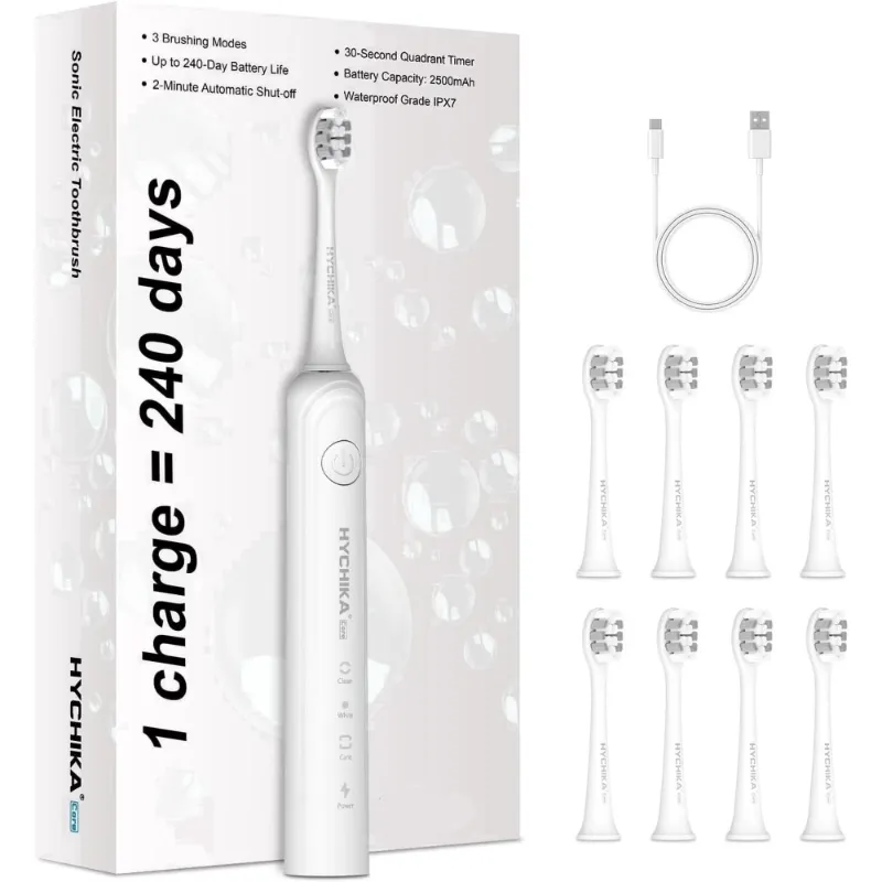 HYCHIKA 240 Days Battery Life Rechargeable Electric Toothbrush for Adults in white with replacement brush heads