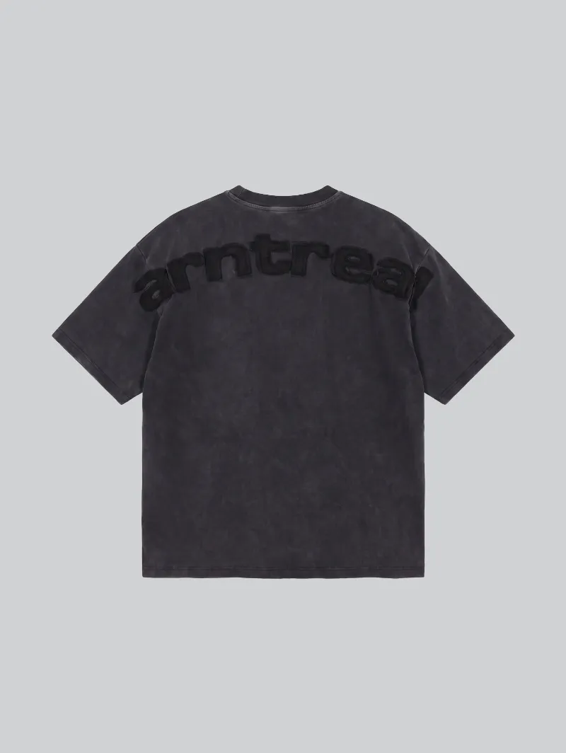 ARNTREAL Patch Black T-shirt in washed black cotton with embroidered logo and back patch