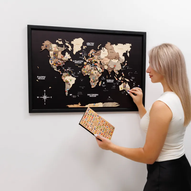 Enjoy The Wood 3D Wooden Panel World Map Smokey showing layered continents in gray-brown tones