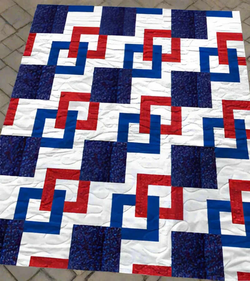 Boho Blanket Interlocking Paths Quilt Pattern showing a bold tree-ring quilt design in layered colors