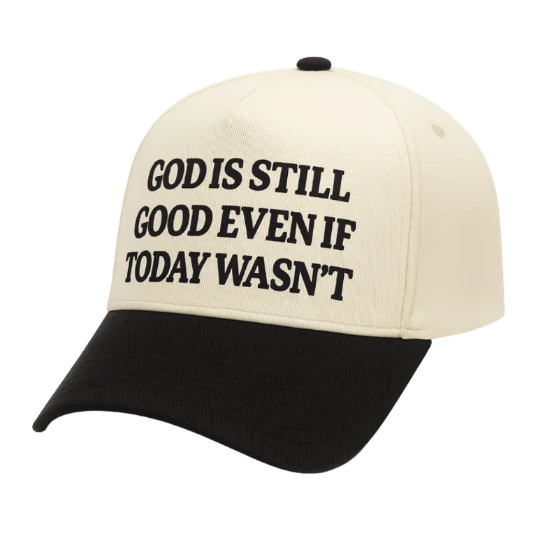 We The Believers God Is Still Good Even If Today Wasn't 5 Panel Embroidered Hat showing a cream and black trucker hat