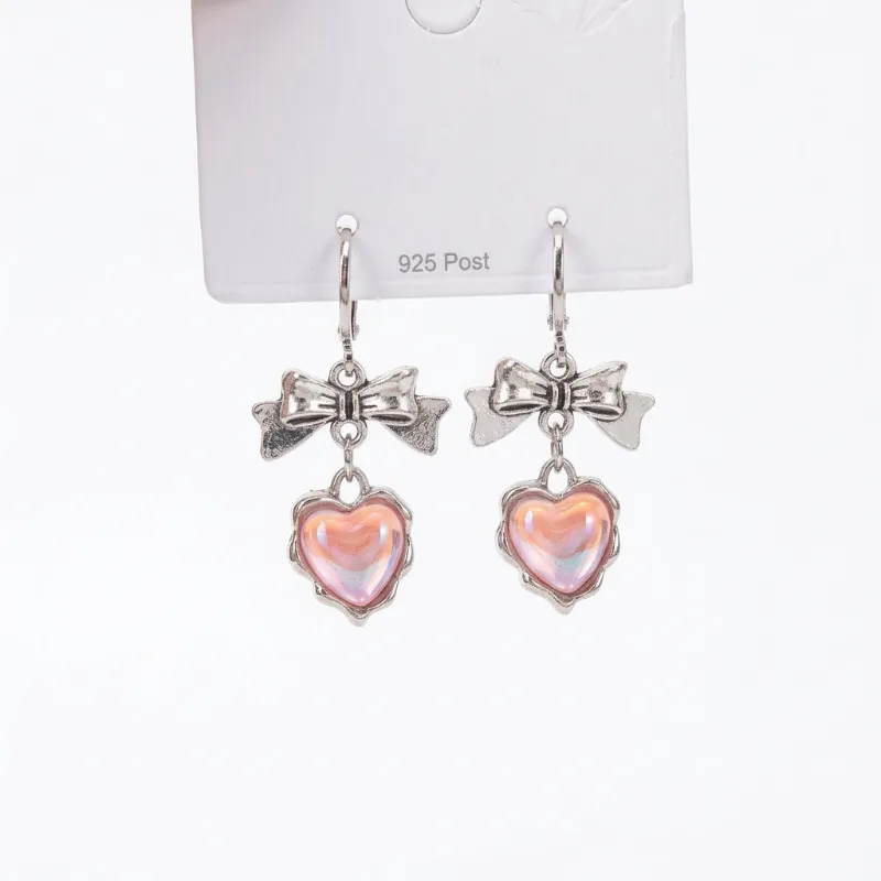Shoptery Jirai Kei Silver Bow & Iridescent Heart Dangle Hoop Earrings with heart pendants
