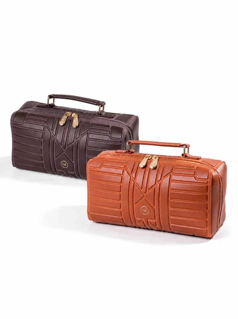 Nuban Beauty NC Beauty Bag with gold details, shown open with makeup inside