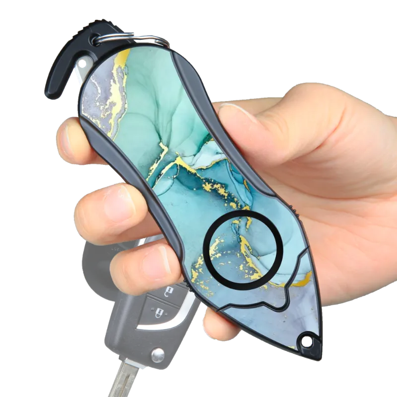 The Stinger Tools Stinger Personal Safety Alarm Keychain in Green Marble with siren, seatbelt cutter, and glass breaker
