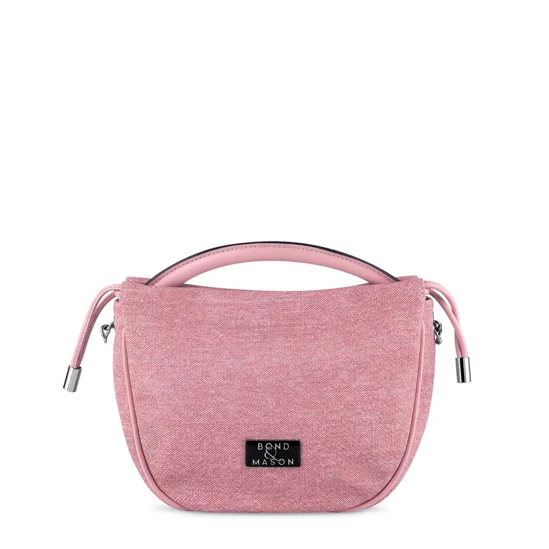 Bond & Mason The Margaux Handbag shown as a compact vegan leather handbag with silver-tone hardware