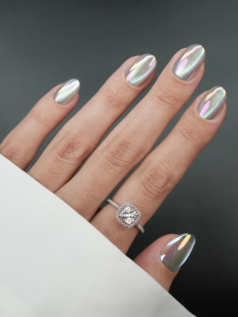 Roxy Nails Paris From Venus press on nails with translucent blue base and multicolor mermaid chrome