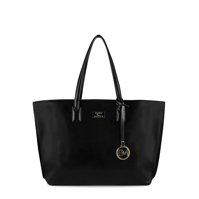Bond & Mason The Mary Tote Bag shown as a wide vegan leather tote with gold-tone hardware