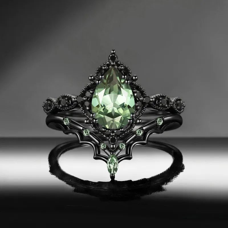 Starlandus 'Bat's Whisper' Gothic Pear Cut Lab Green Sapphire Alternative Bridal Engagement Ring Set with Bat Wings in Black Gold