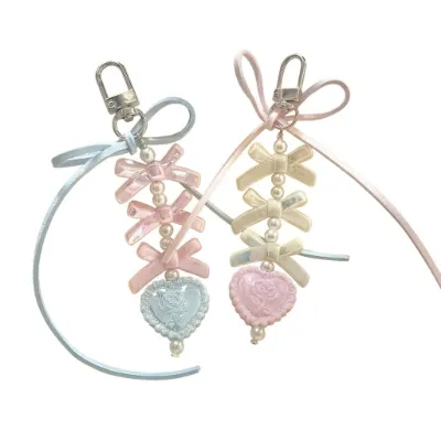 Shoptery Fairy Kei Pastel Bow Pearl Rose Heart Bag Charm Keychain with layered bows and heart pendant