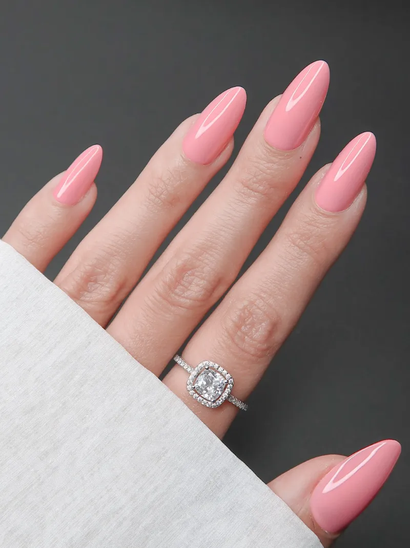 Roxy Nails Paris Azalea long almond nails in luminous warm pink with glossy finish