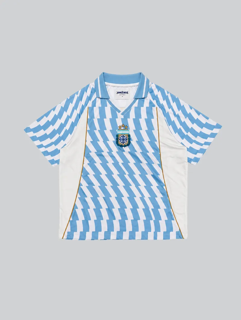 ARNTREAL Argentina Jersey in white and light blue with geometric sun ray pattern and embroidered crest
