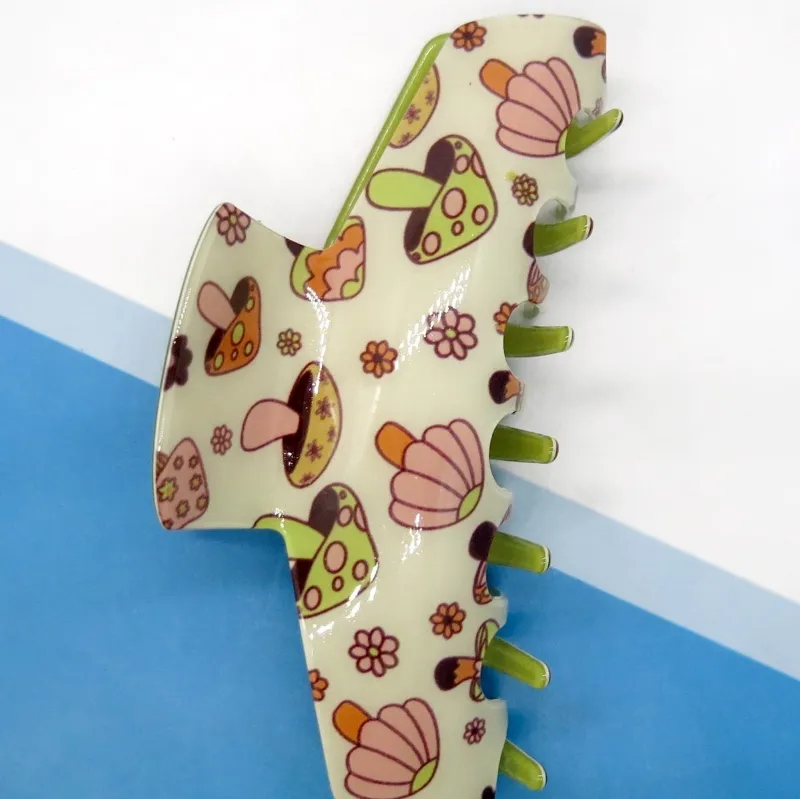 High Dreams Hair Claw Mushroom featuring colorful mushroom and floral print on a large semicircle hair clip
