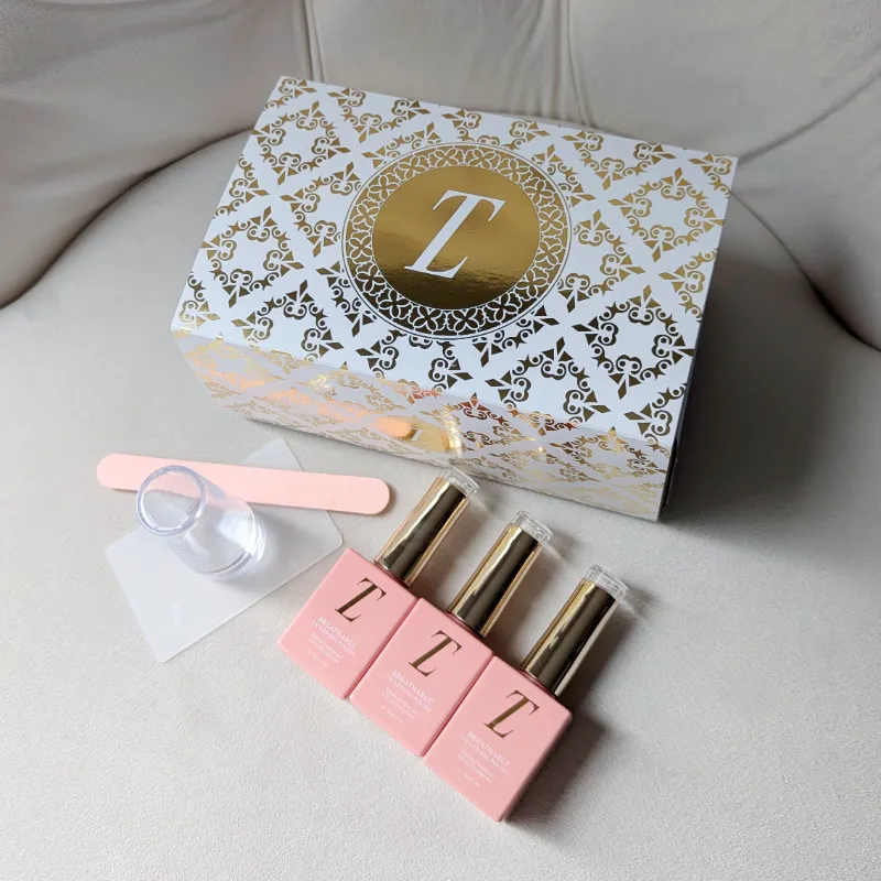 Tuesday in Love French Manicure Gift Set with basecoat, topcoat, white gel polish, nail file, and stamp in gold and white box