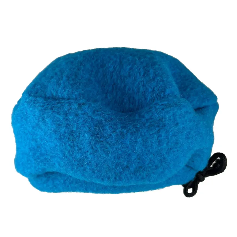Nammi Beret Hat in turquoise by Ófeigur showing handmade Icelandic designer accessory