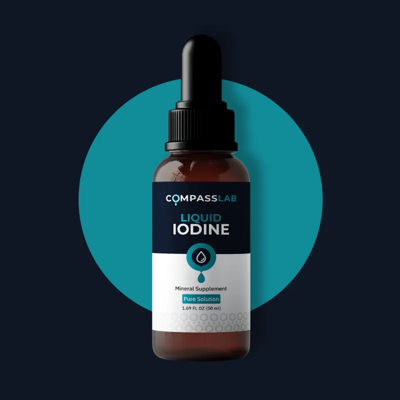 Compass Laboratory Liquid Iodine Drops bottle held up to light