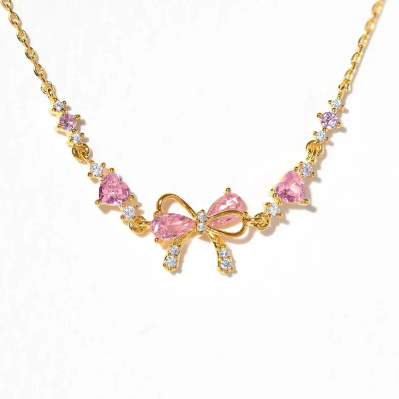 FabuLove Bow Bracelet featuring a dainty bow charm with sparkling accents