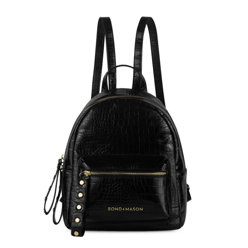 Bond & Mason The Bellamy Backpack shown with fabric and vegan leather body and gold hardware