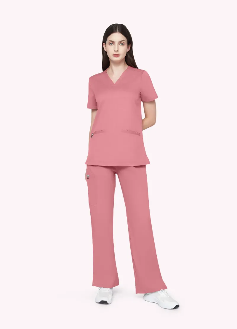 COMENII StyleFlex 7-Pocket Essential Scrub Set in pink with top and pants