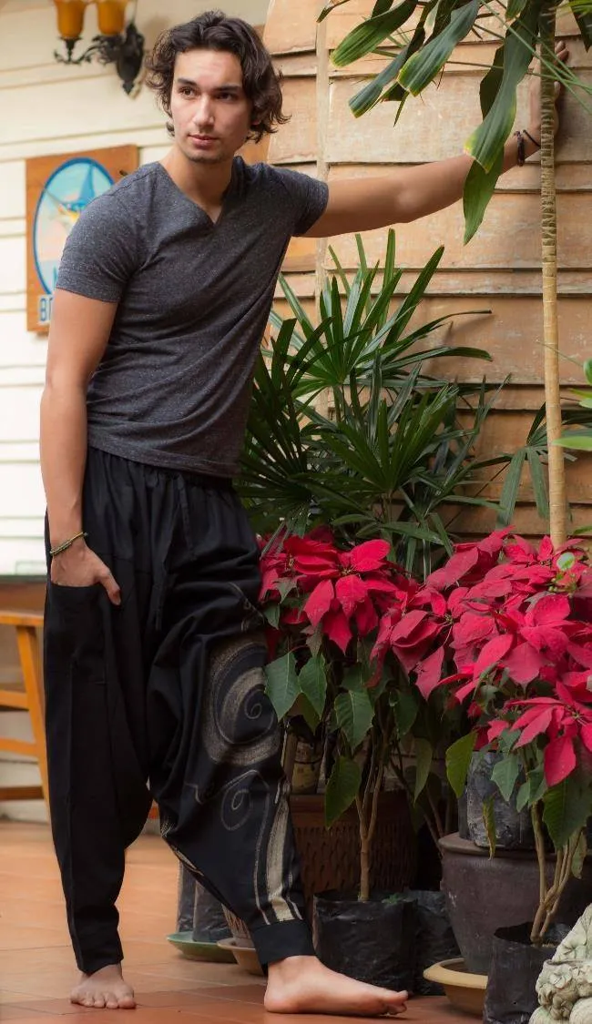 Hippie Pants Black Evolution Pants, solid dark color with golden spiral on leg
