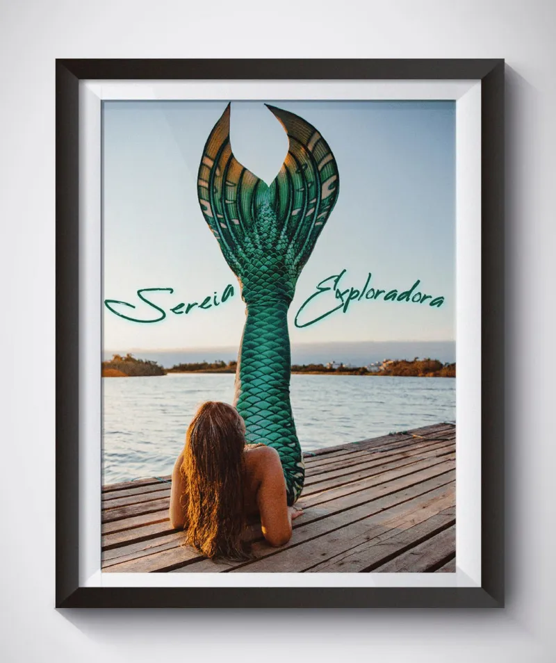 Sereia Guardiã Sereia Exploradora wall frame, a fabric print in a black frame with white border