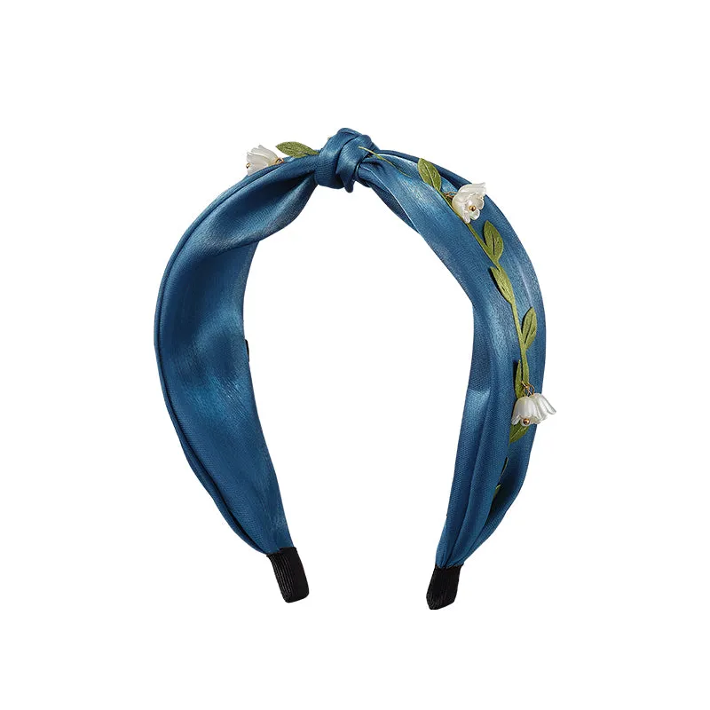Florasis Lily of the Valley Headband in cyan silk