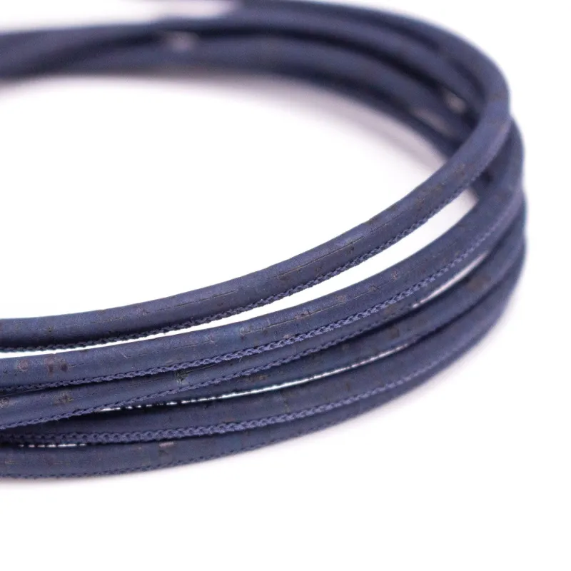 Corkadia 10m dark blue cork cord COR-576 coiled to show its navy blue cork leather texture