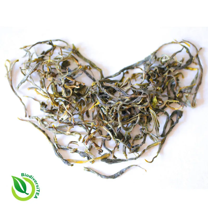 Wild Tea Qi Ancient Artisan Baked Heart Green Tea loose leaf in dark twisted leaves