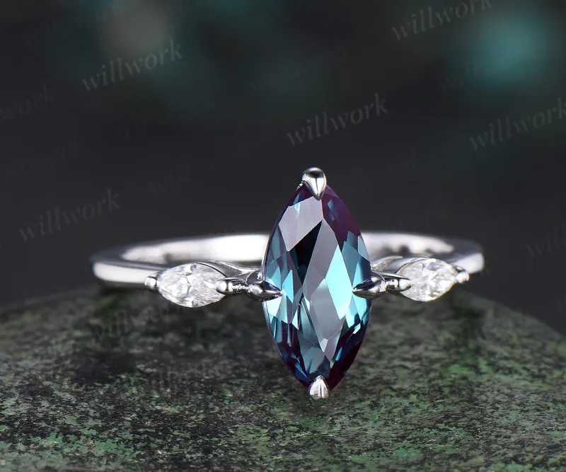 WillWork Jewelry 1ct Marquise cut alexandrite engagement ring, white gold three stone design on ring stand